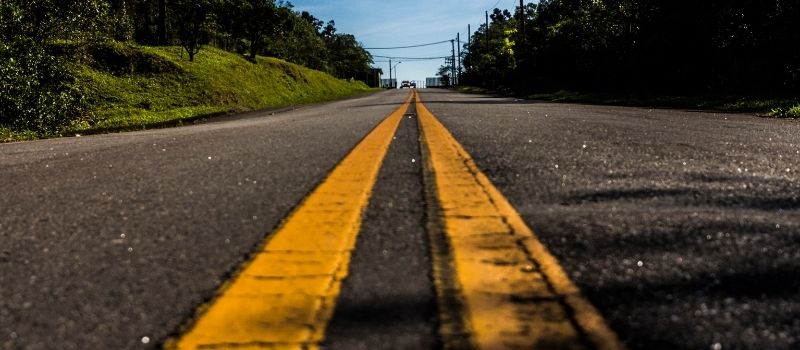 How to get traffic to your affiliate links - a road with yellow lines